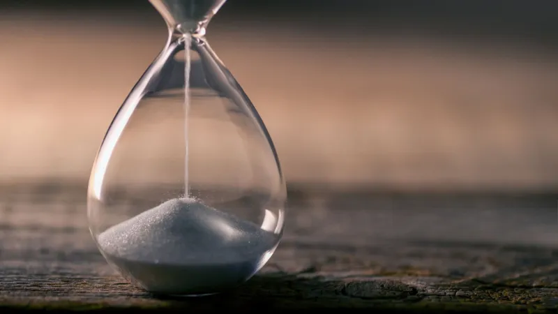 Hourglass with white sand