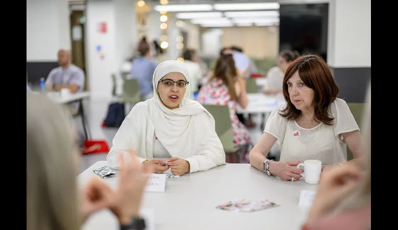 Teachers discussing around a table
