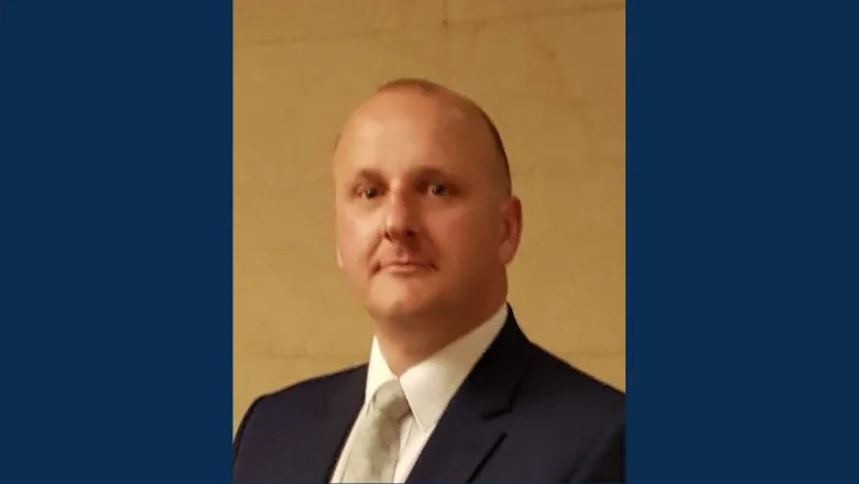 James pearson-jenkins thumbnailman in a suit and tie.