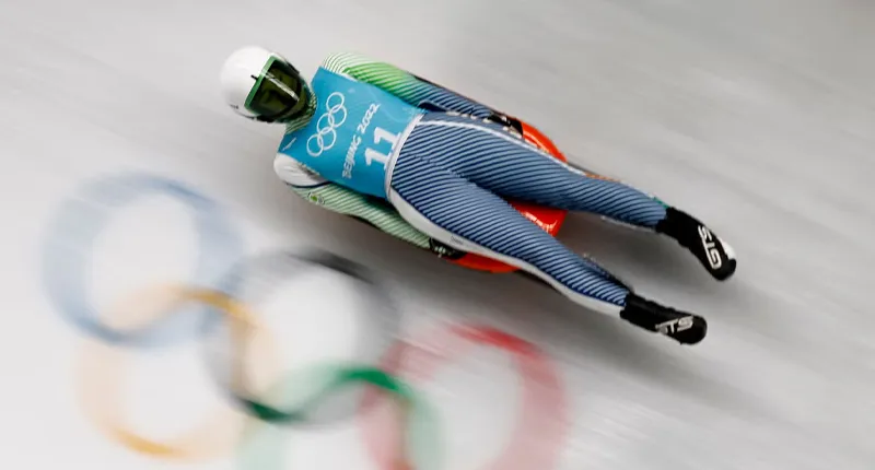 King's alumni and luger, Elsa Demond, on a luge competing at the Olympics.